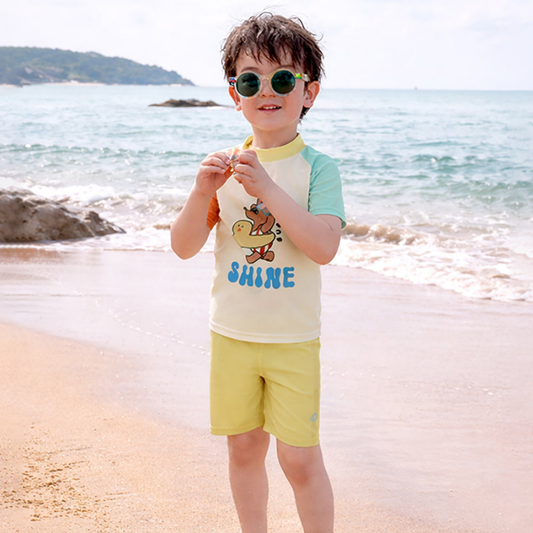 2 Pcs T-Shirt & Shorts Set Ivory, Teal & Yellow "Shine" Cartoon Print UPF 50+ Kids Swimwear with Matching Swim Cap With Free Wash Bag