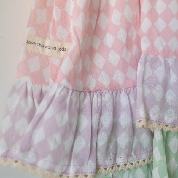 Pocketful of Sunsets dress in rhombus block print