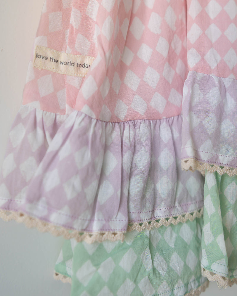 Pocketful of Sunsets dress in rhombus block print