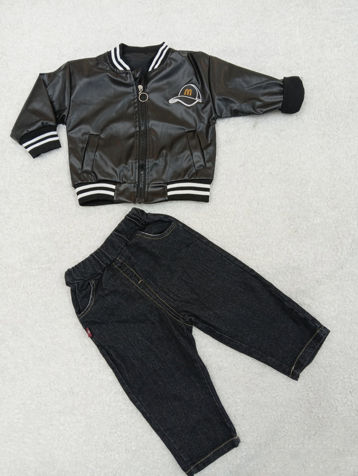 Black Leather Jacket with Blue Denims