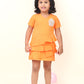 Orange Polo Dress With V-Neck And Flattering Ruffles All Over With Hand-Made Cupcake Embellishment
