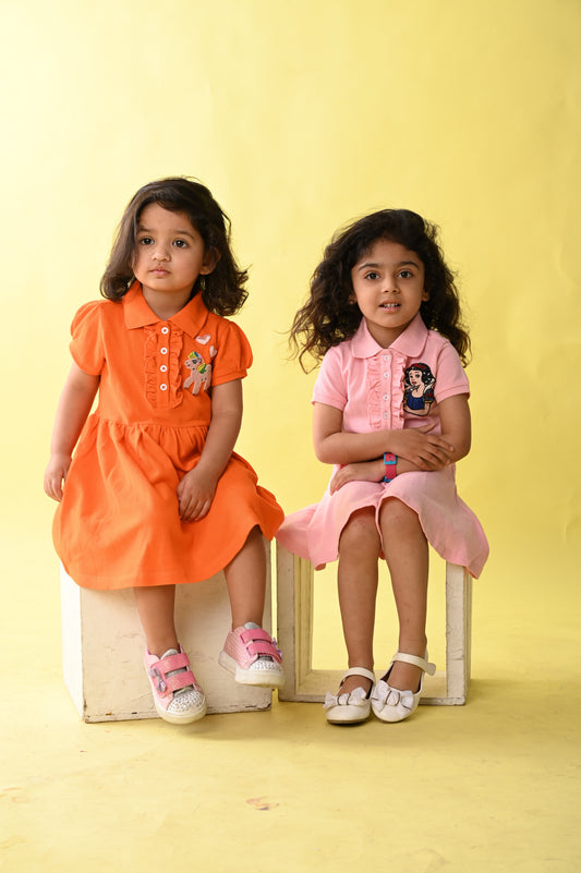 Blush Pink Polo Dress With Drop Waist Silhouette And Frills At The Placket With Snowhite Hand Embellishment