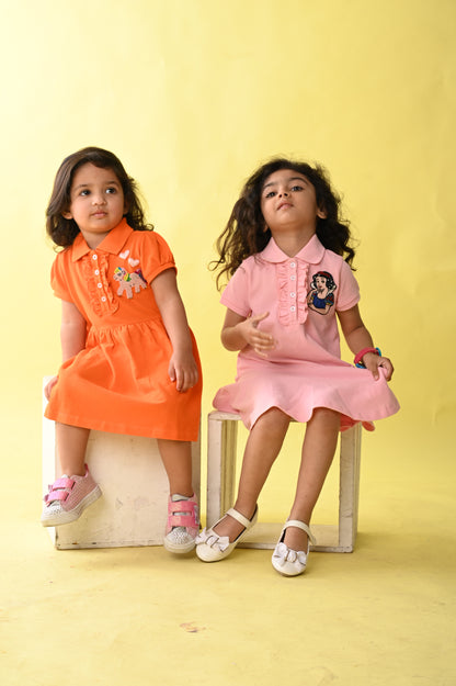 Blush Pink Polo Dress With Drop Waist Silhouette And Frills At The Placket With Snowhite Hand Embellishment
