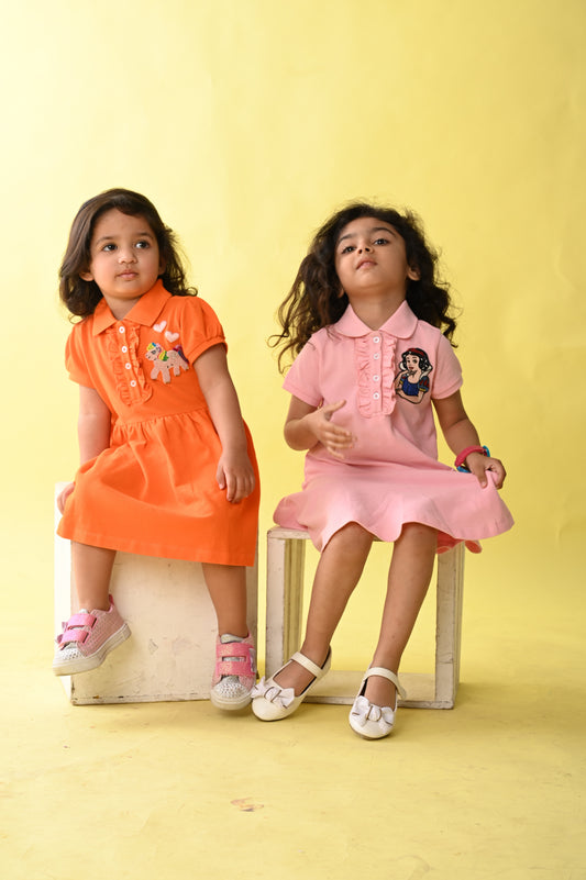 Blush Pink Polo Dress With Drop Waist Silhouette And Frills At The Placket With Snowhite Hand Embellishment