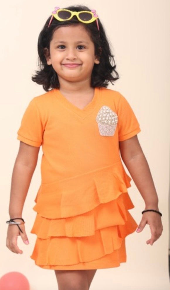 Orange Polo Dress With V-Neck And Flattering Ruffles All Over With Hand-Made Cupcake Embellishment