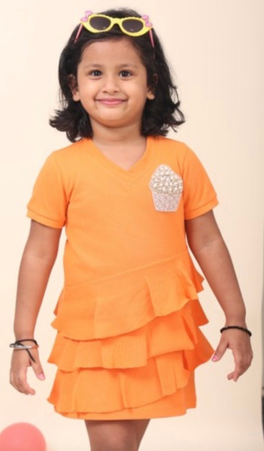 Orange Polo Dress With V-Neck And Flattering Ruffles All Over With Hand-Made Cupcake Embellishment