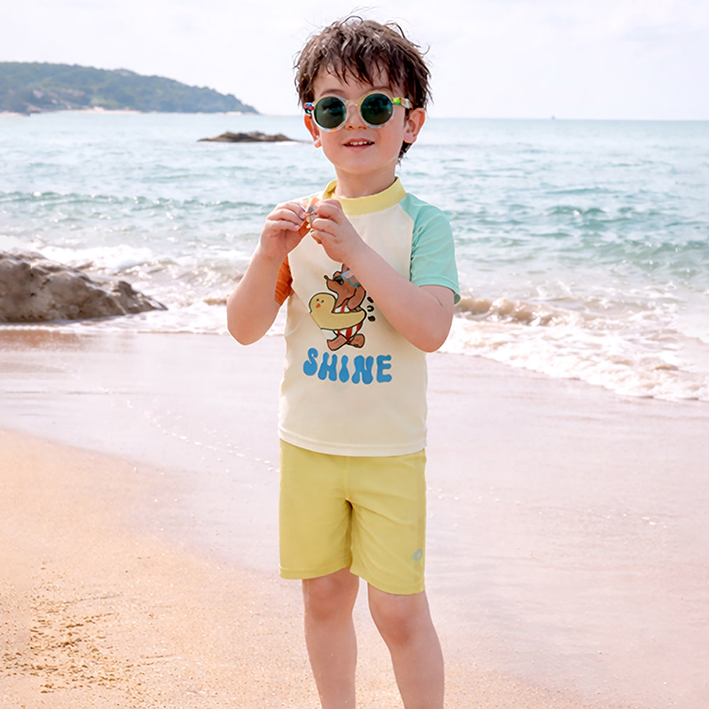 2 Pcs T-Shirt & Shorts Set Ivory, Teal & Yellow "Shine" Cartoon Print UPF 50+ Kids Swimwear with Matching Swim Cap With